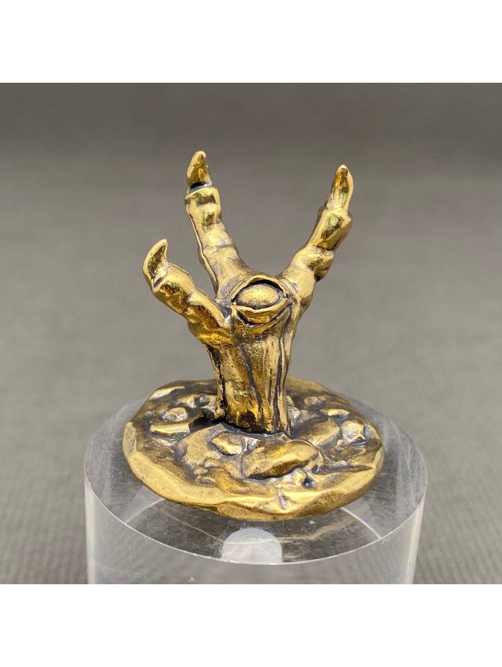 Brass Sculpture of a Hand Emerging from Ground